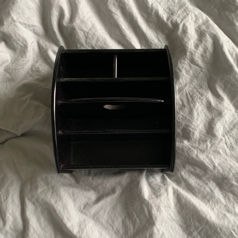 Swivel living room stand for remotes etc